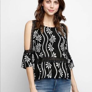 Abbeline cold shoulder embroidered open back top